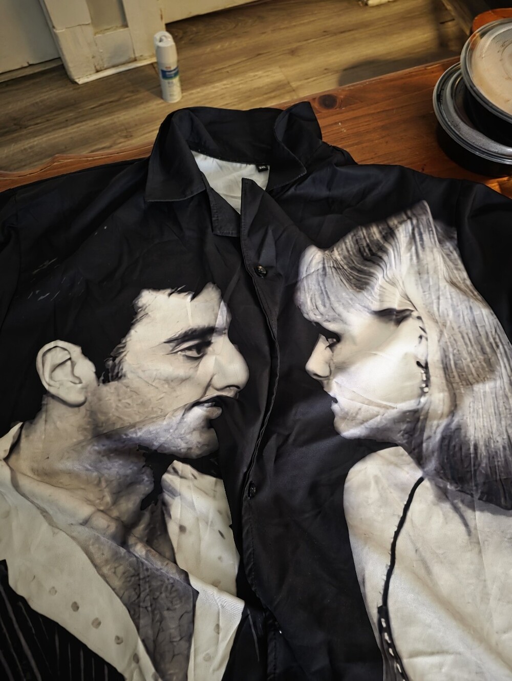 Black Graphic Button-Up Shirt with Monochrome Portrait Print